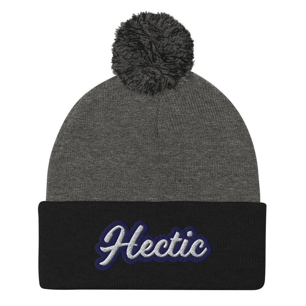 Black and Gray Hectic Beanie from Nina's Funky Shop by ninanush - Hectic ⚡ This unique Hectic Hat is warm, cozy, designed by Nina and made just for you. It's a comfortable unisex hectic beanie with a pom pom on top, expertly embroidered with the word "hectic". The perfect funny accessory for everyday streetwear or gift for that hectic friend.