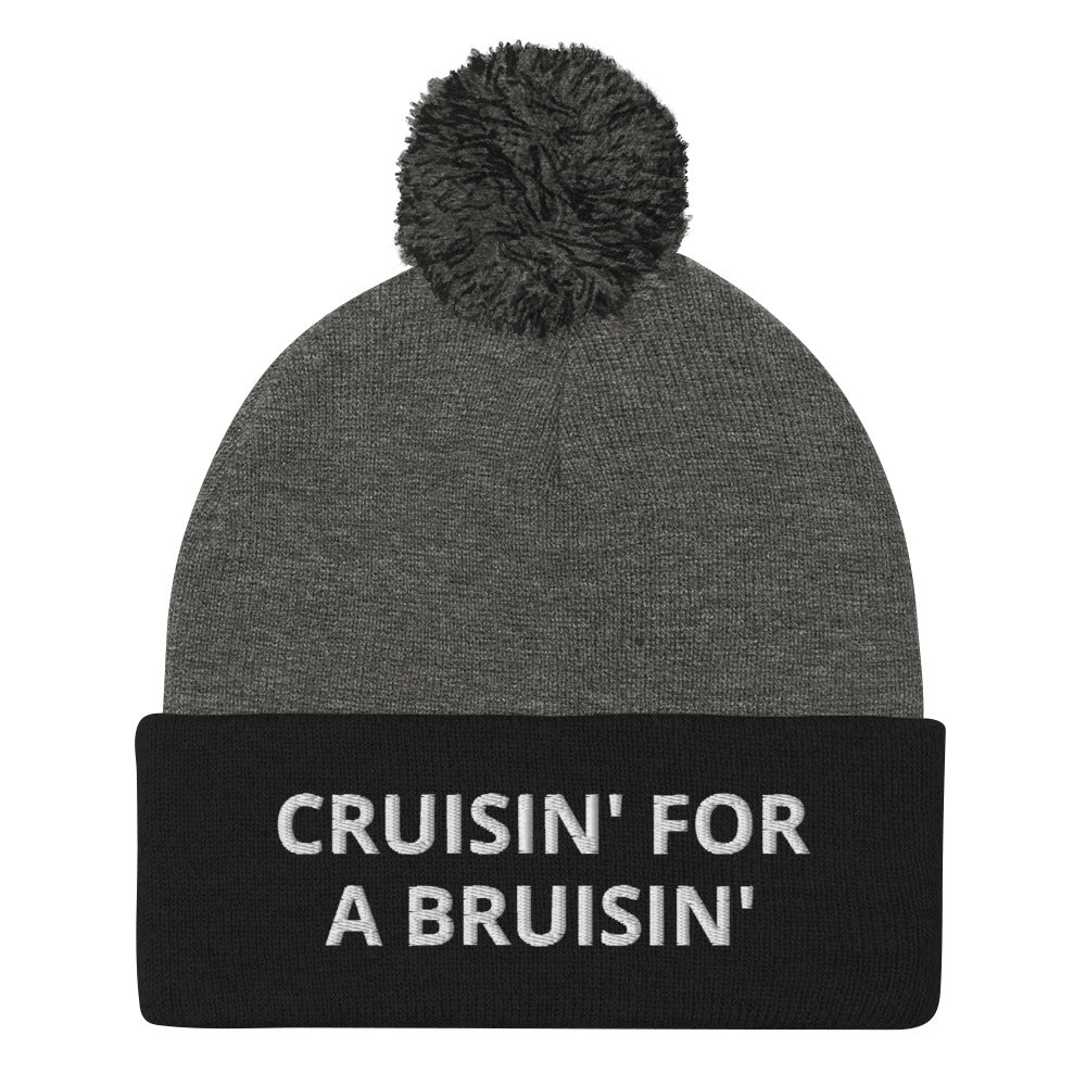 Black and Gray Cruisin' for a Bruisin' Hat from Nina's Funky Shop by ninanush - This Cruisin' For A Buisin' Hat is warm, cozy, designed by Nina and made just for you. It's a comfortable unisex garlic beanie with a pom pom on top, expertly embroidered with the words "Cruisin For A Bruisin'". Stand out and stay warm in the perfect weird and funny beanie for all your cold weather looks.