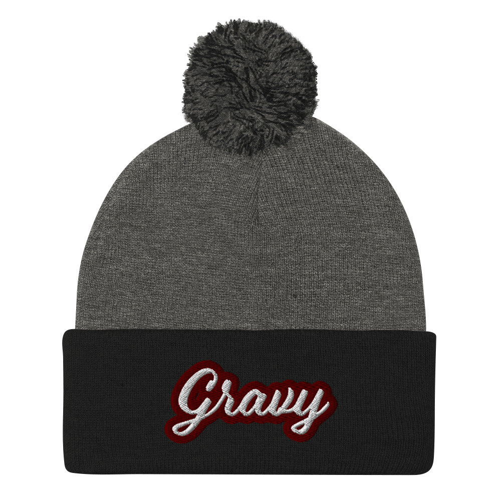 Black and Gray Gravy PomPom Beanie from Nina's Funky Shop by Ninanush - Do you love gravy? Looking for a fun foodie gift? This warm and cozy, embroidered pom pom beanie is just what you need. Eat gravy and celebrate your favorite foods in style with this funny foodie Beanie with "Gravy", expertly embroidered on the front. Perfect for gravy lovers and foodies of all kinds.
