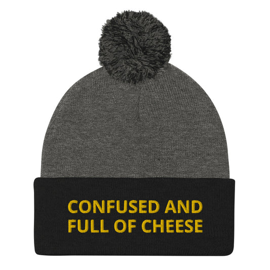 Black and gray beanie with confused and full of cheese embroidered on the front - Do you love cheese? Looking for a funny gift for a foodie? This warm and cozy, embroidered beanie is just what you need. It's a classic pom pom beanie with "Confused and full of cheese", expertly embroidered on the front. The perfect funny beanie for cheese lovers and foodies of all kinds. 