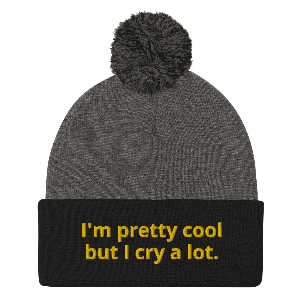 Funny Black and Gray Beanie - Looking for a funny gift? A unique hat with a message? This beanie is warm and cozy with a classic pom pom on top and "I'm pretty cool but I cry a lot.", expertly embroidered on the front. Looking for something personalized? Shoot us an email!