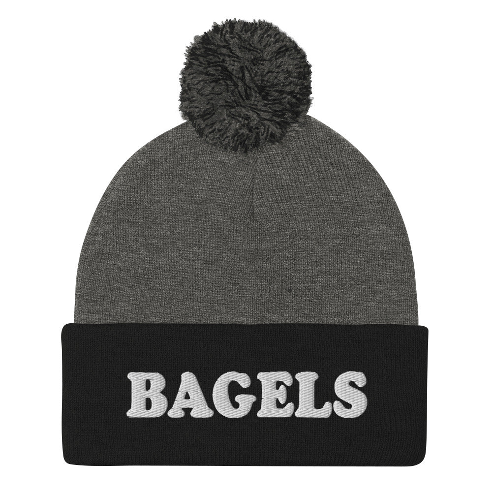 Black and Gray Bagels Beanie -Are you a bagel enthusiast? Looking for a gift for a foodie? Our Bagels Beanie is comfortable, cozy and expertly embroidered just for you. It's a funny beanie with a pom pom on top, perfect for everyday streetwear for bagel lovers and foodies of all kinds.