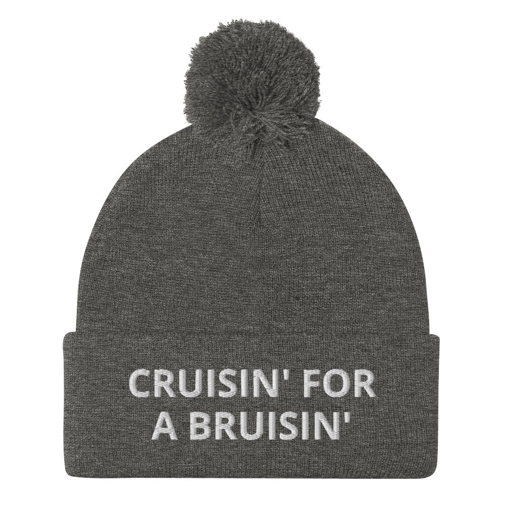 Gray Cruisin' for a Bruisin' Hat from Nina's Funky Shop by ninanush - This Cruisin' For A Buisin' Hat is warm, cozy, designed by Nina and made just for you. It's a comfortable unisex garlic beanie with a pom pom on top, expertly embroidered with the words "Cruisin For A Bruisin'". Stand out and stay warm in the perfect weird and funny beanie for all your cold weather looks.