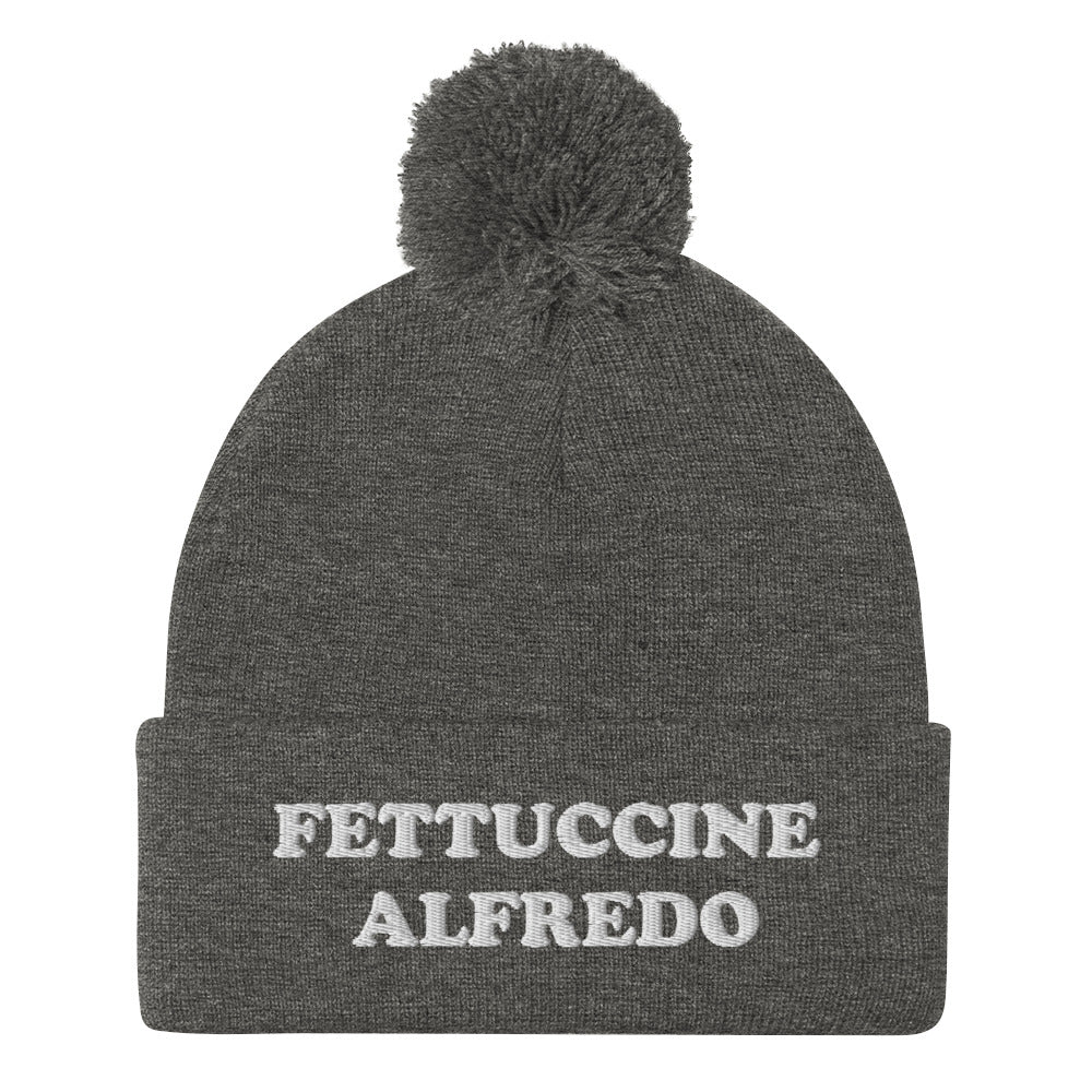 Dark Gray Fettuccine Alfredo Pom Pom Beanie from Nina's Funky Shop by ninanush - Do you love Fettuccine Alfredo? Looking for a funny foodie gift? This warm and cozy, embroidered beanie is just what you need. It's a classic pom pom beanie with "Fettuccine Alfredo", expertly embroidered on the front. The perfect funny beanie for pasta lovers, fettuccine Alfredo enthusiasts and foodies of all kinds.