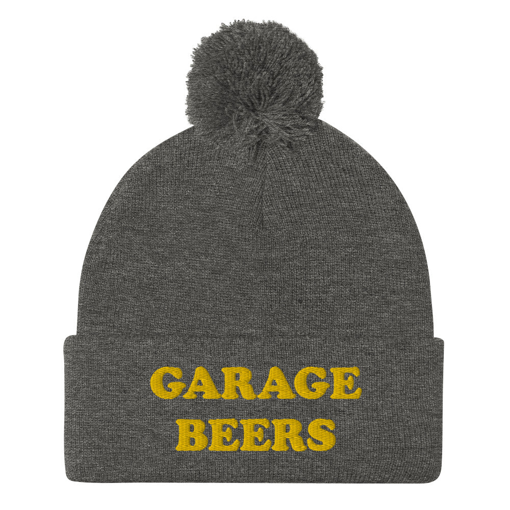 Gray Garage Beers Beanie from Nina's Funky Shop - Love beer? Looking for a funny gift for a friend? This warm and cozy, embroidered beer beanie is just what you need. It's a classic pom pom beanie with "garage beers", expertly embroidered on the front. The perfect funny beanie for beer lovers. Celebrate your favorite foods in our funky foodie apparel.