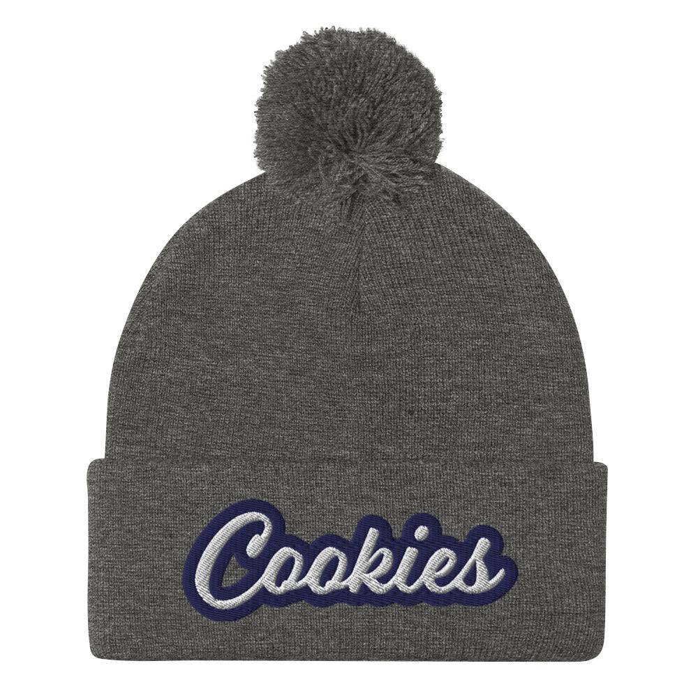 Gray Cookie Hat - Love Cookies? Looking for a gift for a foodie? This cookies hat is just for you! It's a warm and cozy beanie with a classic pom pom on top and "Cookies", expertly embroidered on the front. Designed by Nina and made just for you! Looking for something personalized? A different embroidery color? Shoot us an email or check out our customizable apparel!