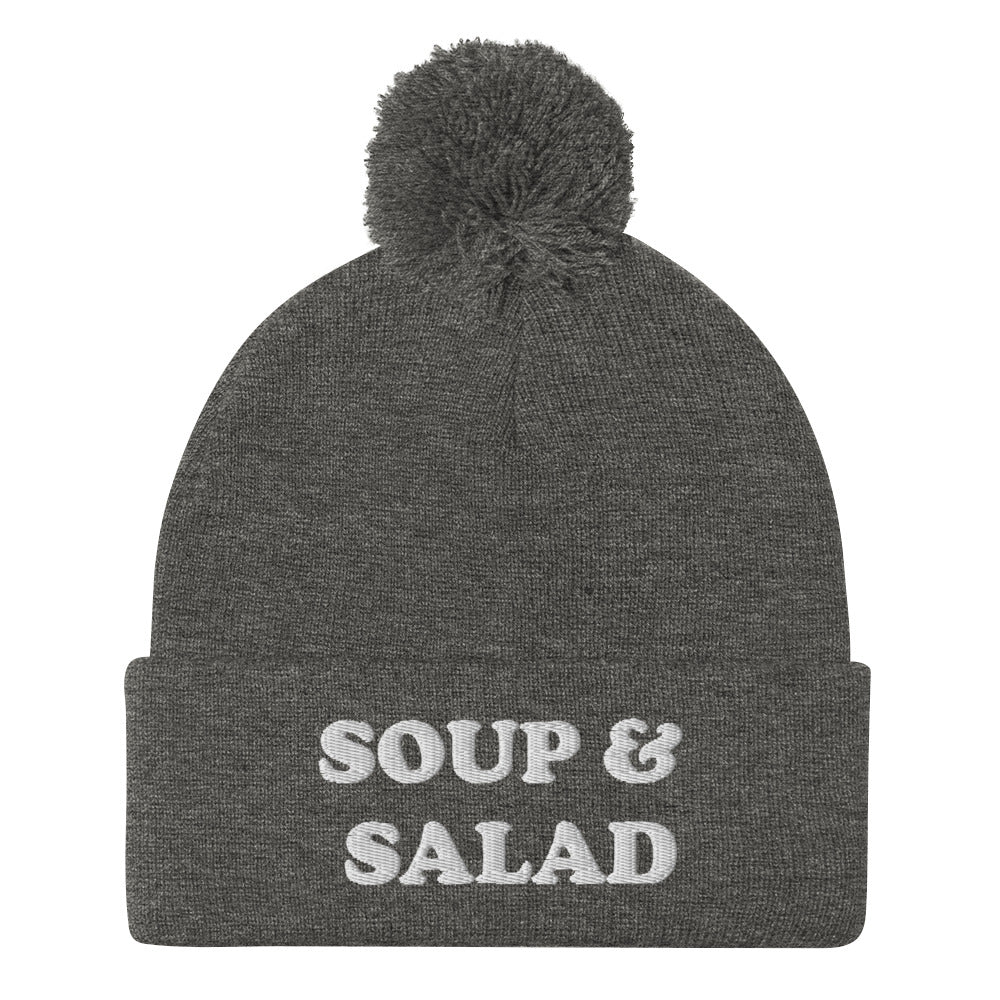 Gray Soup and Salad Beanie - Our Soup And Salad Beanie is warm, cozy and made just for you. It's a classic beanie with a pom pom on top. The perfect hat for everyday streetwear or a funny gift for a friend.