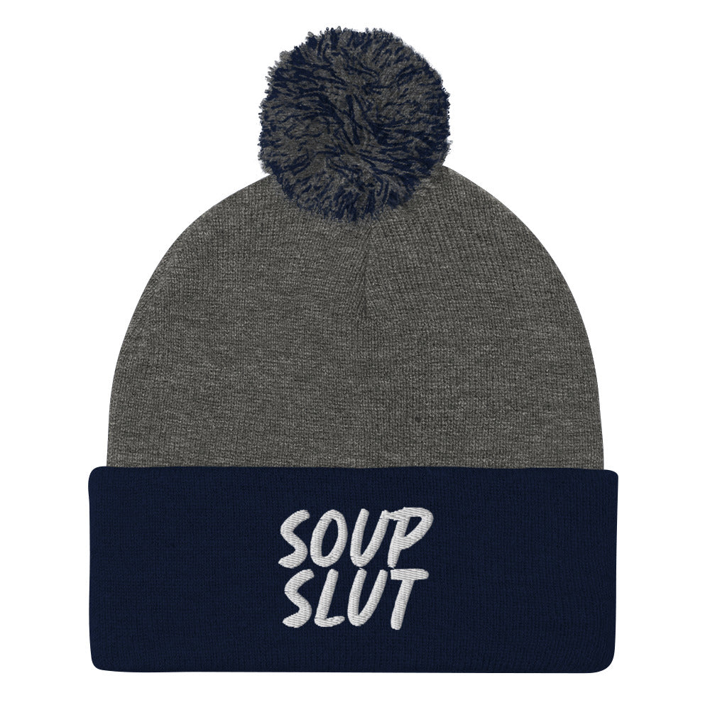 Navy and Gray Soup Slut Beanie from Nina's Funky Shop by ninanush - Do you love soup? Looking for a fun gift for a foodie? This warm and cozy, embroidered pom pom beanie is just what you need. Celebrate your favorite foods in style with this funny foodie Beanie with "soup slut" expertly embroidered on the front. Perfect for soup lovers and foodies of all kinds.