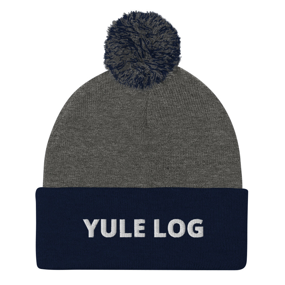 Navy and Gray Yule Log Beanie from Nina's Funky Shop by ninanush - Do you love yule logs? Looking for a funny holiday hat? This warm and cozy, embroidered pom pom beanie is just what you need. Celebrate your favorite foods in style with this funny foodie Beanie with "Yule Log", expertly embroidered on the front. The perfect funny holiday gift or Christmas beanie for yule log lovers.