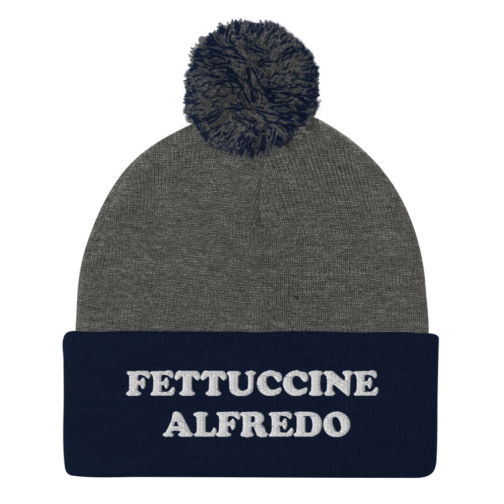 Navy and Gray Fettuccine Alfredo Pom Pom Beanie from Nina's Funky Shop by ninanush - Do you love Fettuccine Alfredo? Looking for a funny foodie gift? This warm and cozy, embroidered beanie is just what you need. It's a classic pom pom beanie with "Fettuccine Alfredo", expertly embroidered on the front. The perfect funny beanie for pasta lovers, fettuccine Alfredo enthusiasts and foodies of all kinds.