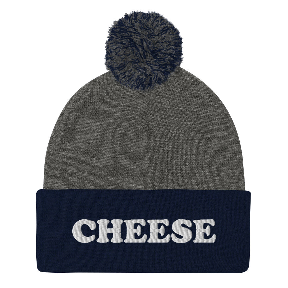 Gray and Navy Embroidered Cheese Beanie from Nina's Funky Shop by ninanush - Do you love cheese? Looking for a funny foodie gift? This warm and cozy, embroidered beanie is just what you need. It's a classic pom pom beanie with "Cheese", expertly embroidered on the front. The perfect funny beanie for cheese lovers and foodies of all kinds. Eat cheese in style in our funky cheese enthusiast hats.