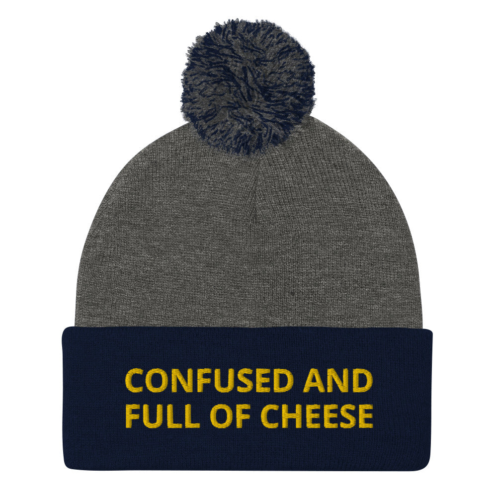 Navy and gray beanie with confused and full of cheese embroidered on the front - Do you love cheese? Looking for a funny gift for a foodie? This warm and cozy, embroidered beanie is just what you need. It's a classic pom pom beanie with "Confused and full of cheese", expertly embroidered on the front. The perfect funny beanie for cheese lovers and foodies of all kinds.