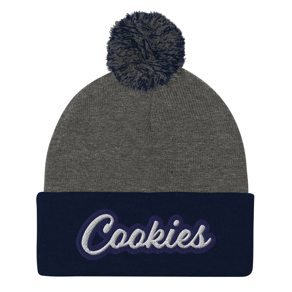 Gray and Navy Cookie Hat - Love Cookies? Looking for a gift for a foodie? This cookies hat is just for you! It's a warm and cozy beanie with a classic pom pom on top and "Cookies", expertly embroidered on the front. Designed by Nina and made just for you! Looking for something personalized? A different embroidery color? Shoot us an email or check out our customizable apparel!