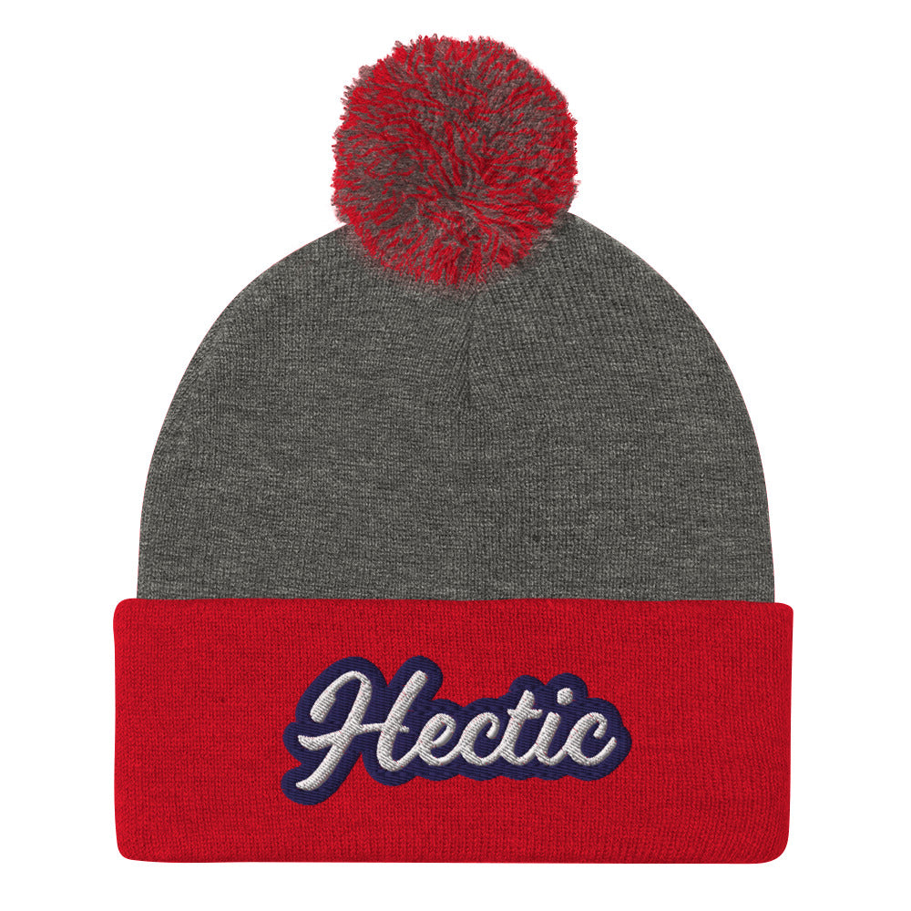 Red and Gray Hectic Beanie from Nina's Funky Shop by ninanush - Hectic ⚡ This unique Hectic Hat is warm, cozy, designed by Nina and made just for you. It's a comfortable unisex hectic beanie with a pom pom on top, expertly embroidered with the word "hectic". The perfect funny accessory for everyday streetwear or gift for that hectic friend.