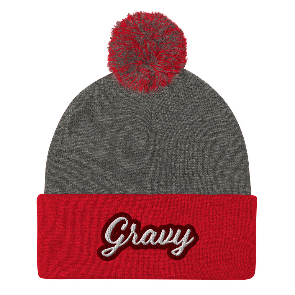 Red and Gray Gravy PomPom Beanie from Nina's Funky Shop by Ninanush - Do you love gravy? Looking for a fun foodie gift? This warm and cozy, embroidered pom pom beanie is just what you need. Eat gravy and celebrate your favorite foods in style with this funny foodie Beanie with "Gravy", expertly embroidered on the front. Perfect for gravy lovers and foodies of all kinds.