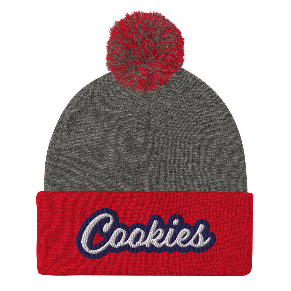 Red and Gray Cookie Hat - Love Cookies? Looking for a gift for a foodie? This cookies hat is just for you! It's a warm and cozy beanie with a classic pom pom on top and "Cookies", expertly embroidered on the front. Designed by Nina and made just for you! Looking for something personalized? A different embroidery color? Shoot us an email or check out our customizable apparel!