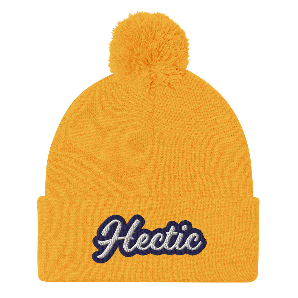 Yellow Hectic Beanie from Nina's Funky Shop by ninanush - Hectic ⚡ This unique Hectic Hat is warm, cozy, designed by Nina and made just for you. It's a comfortable unisex hectic beanie with a pom pom on top, expertly embroidered with the word "hectic". The perfect funny accessory for everyday streetwear or gift for that hectic friend.