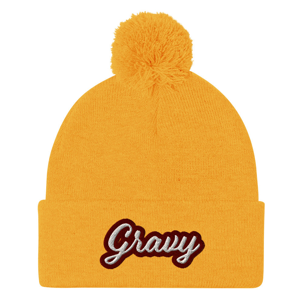 Yellow Gravy PomPom Beanie from Nina's Funky Shop by Ninanush - Do you love gravy? Looking for a fun foodie gift? This warm and cozy, embroidered pom pom beanie is just what you need. Eat gravy and celebrate your favorite foods in style with this funny foodie Beanie with "Gravy", expertly embroidered on the front. Perfect for gravy lovers and foodies of all kinds.