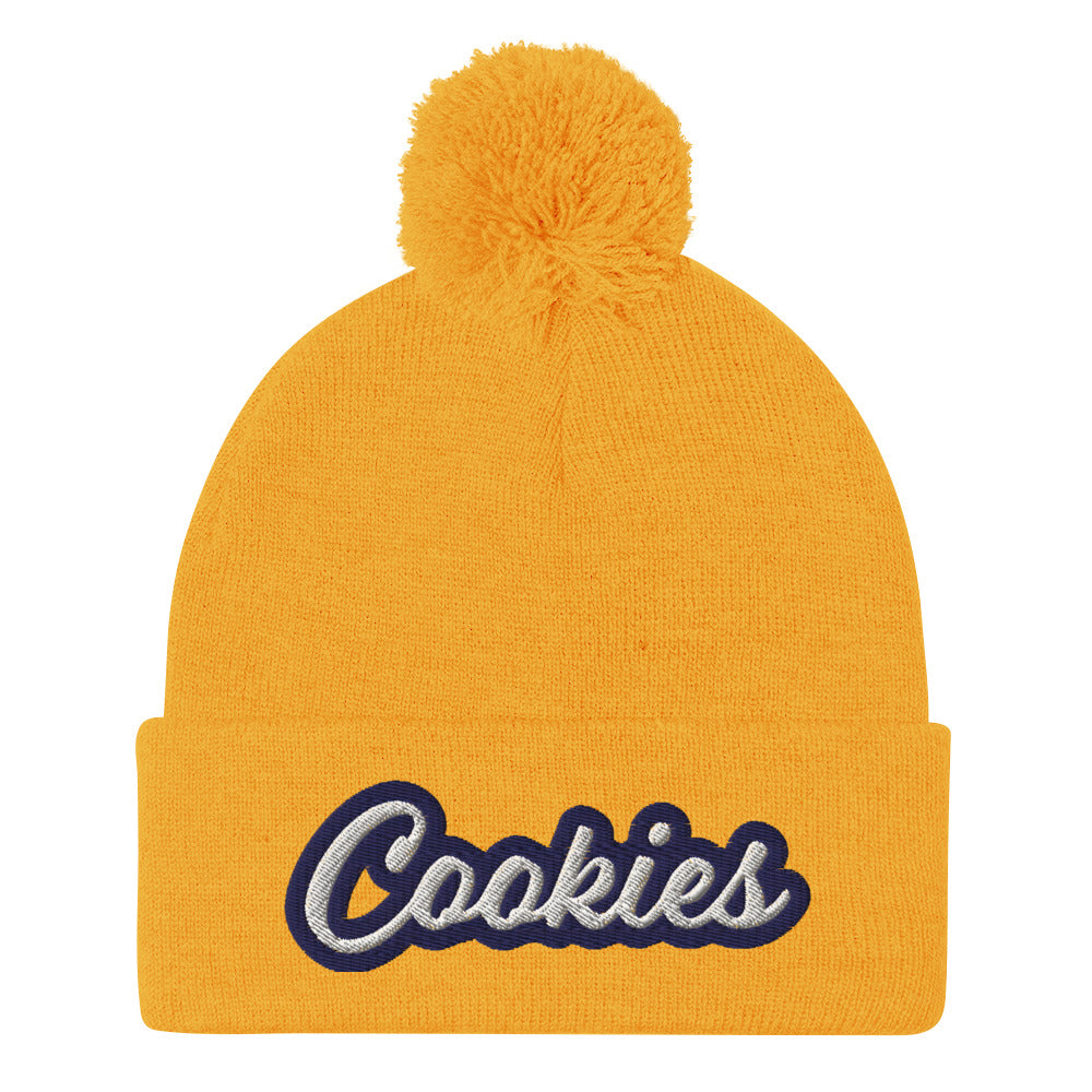 Yellow Cookie Hat - Love Cookies? Looking for a gift for a foodie? This cookies hat is just for you! It's a warm and cozy beanie with a classic pom pom on top and "Cookies", expertly embroidered on the front. Designed by Nina and made just for you! Looking for something personalized? A different embroidery color? Shoot us an email or check out our customizable apparel!