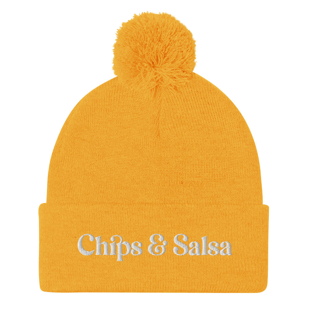 Yellow chips and salsa beanie - Love chips and salsa? Looking for a gift for a salsa enthusiast? This funny beanie is cozy, comfortable and made just for you. It's a classic pom pom beanie with a funny embroidered design. Celebrate your favorite foods in our chips and salsa hat. Looking for something personalized? A different embroidery color? Shoot us an email or check out our customizable apparel!