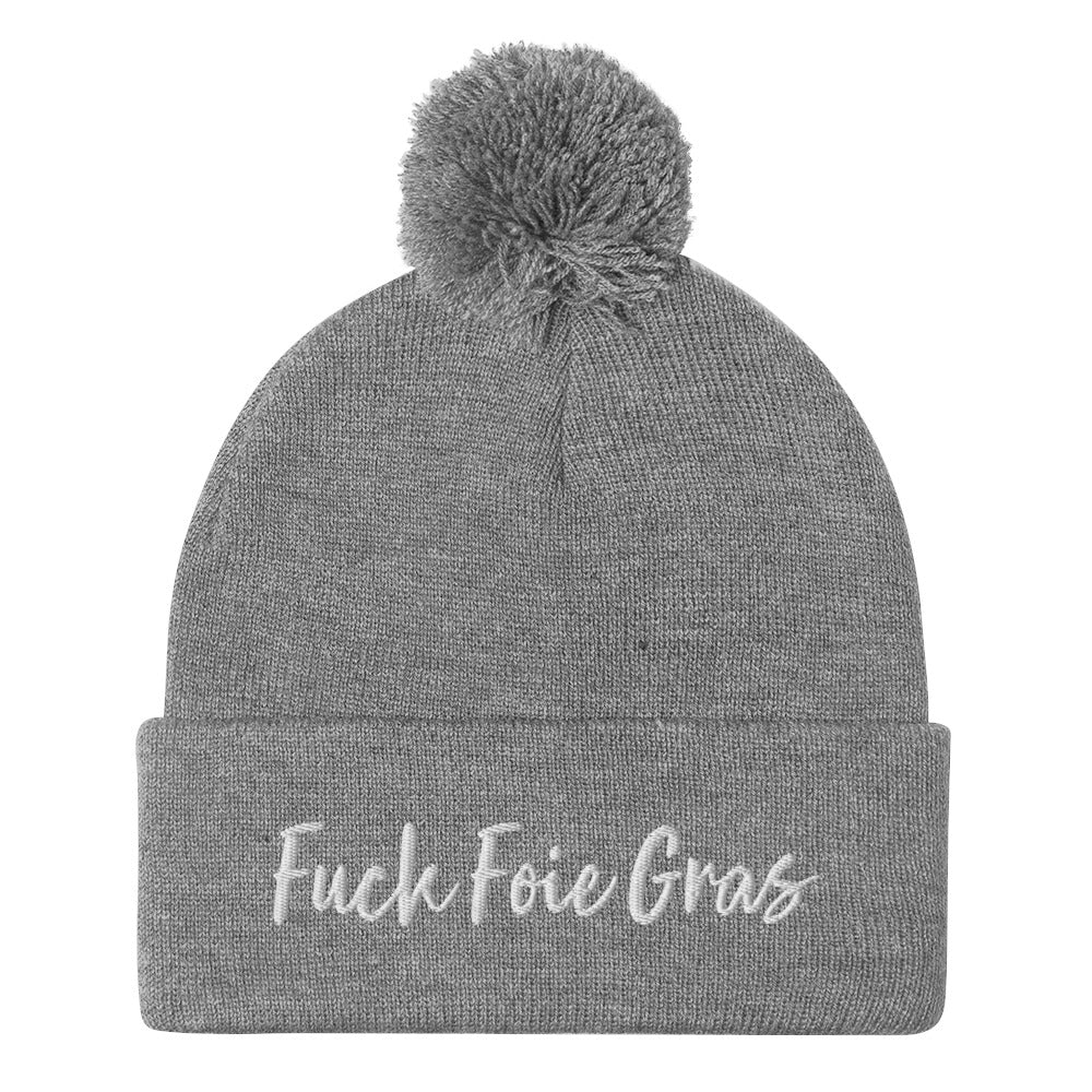 Light gray Fuck Foie Gras beanie from Nina's Funky Shop by ninanush - Wear this Fuck Foie Gras beanie and bring awareness for the cruel production practices. This activist hat is warm, cozy, and embroidered with the words "Fuck Foie Gras". What is Foie Gras? Foie gras, is a delicacy in French cuisine. It's the liver of a goose or duck that has been fattened through force-feeding.