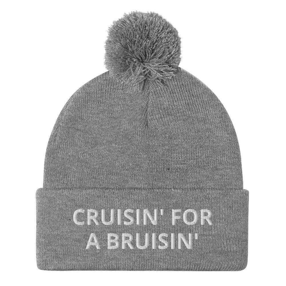 Gray Cruisin' for a Bruisin' Hat from Nina's Funky Shop by ninanush - This Cruisin' For A Buisin' Hat is warm, cozy, designed by Nina and made just for you. It's a comfortable unisex garlic beanie with a pom pom on top, expertly embroidered with the words "Cruisin For A Bruisin'". Stand out and stay warm in the perfect weird and funny beanie for all your cold weather looks.