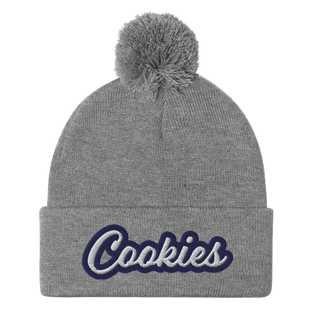 Gray Cookie Hat - Love Cookies? Looking for a gift for a foodie? This cookies hat is just for you! It's a warm and cozy beanie with a classic pom pom on top and "Cookies", expertly embroidered on the front. Designed by Nina and made just for you! Looking for something personalized? A different embroidery color? Shoot us an email or check out our customizable apparel!