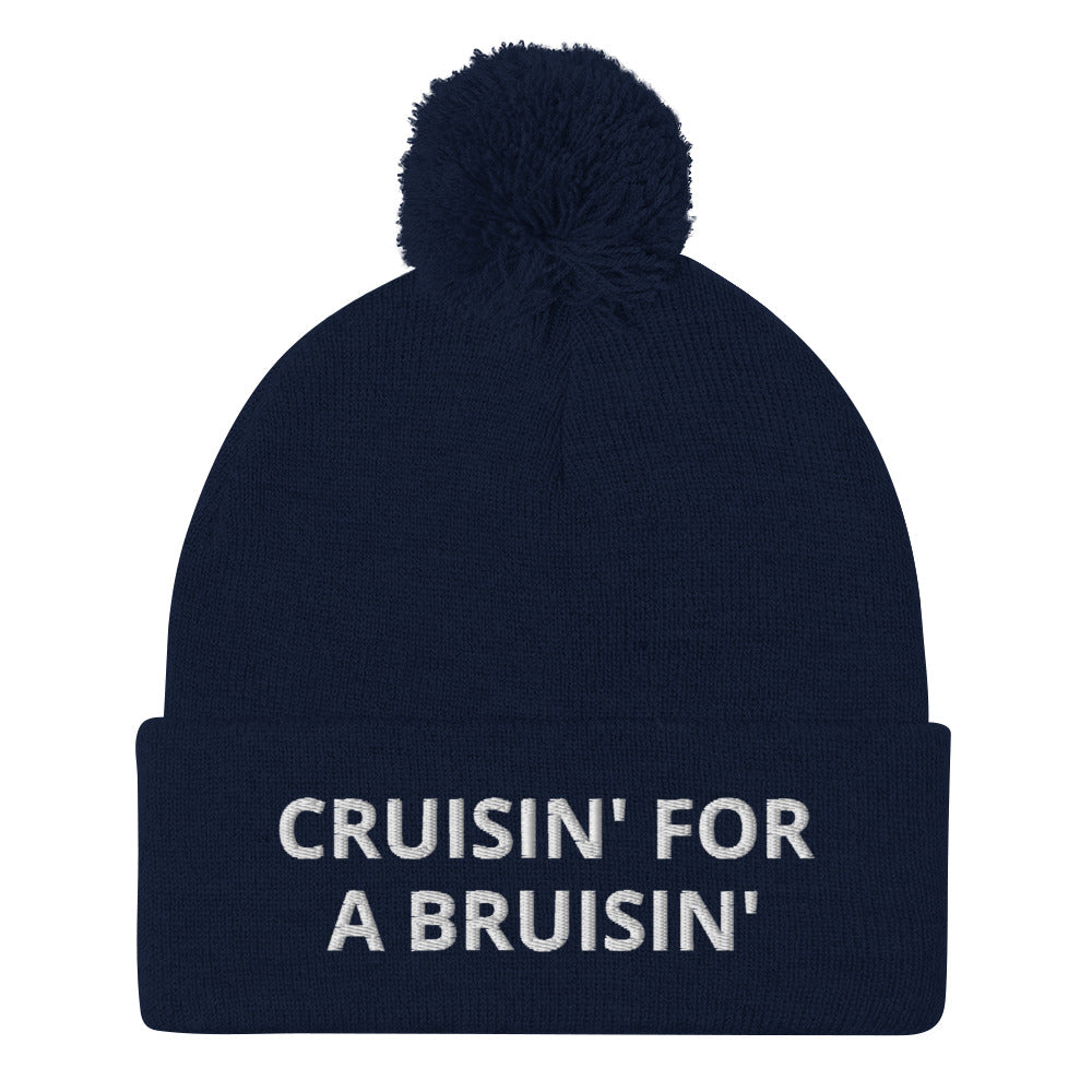 Navy Cruisin' for a Bruisin' Hat from Nina's Funky Shop by ninanush - This Cruisin' For A Buisin' Hat is warm, cozy, designed by Nina and made just for you. It's a comfortable unisex garlic beanie with a pom pom on top, expertly embroidered with the words "Cruisin For A Bruisin'". Stand out and stay warm in the perfect weird and funny beanie for all your cold weather looks.