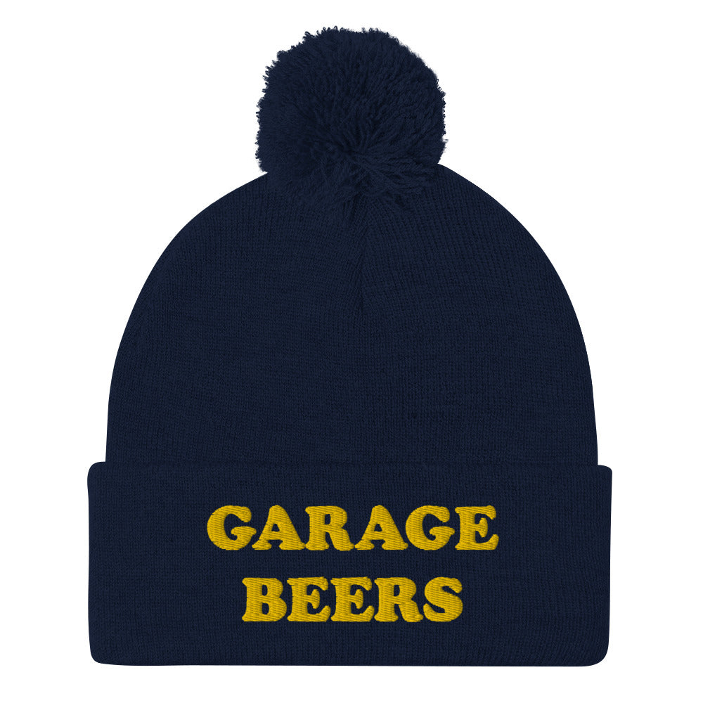 Navy Garage Beers Beanie from Nina's Funky Shop - Love beer? Looking for a funny gift for a friend? This warm and cozy, embroidered beer beanie is just what you need. It's a classic pom pom beanie with "garage beers", expertly embroidered on the front. The perfect funny beanie for beer lovers. Celebrate your favorite foods in our funky foodie apparel.