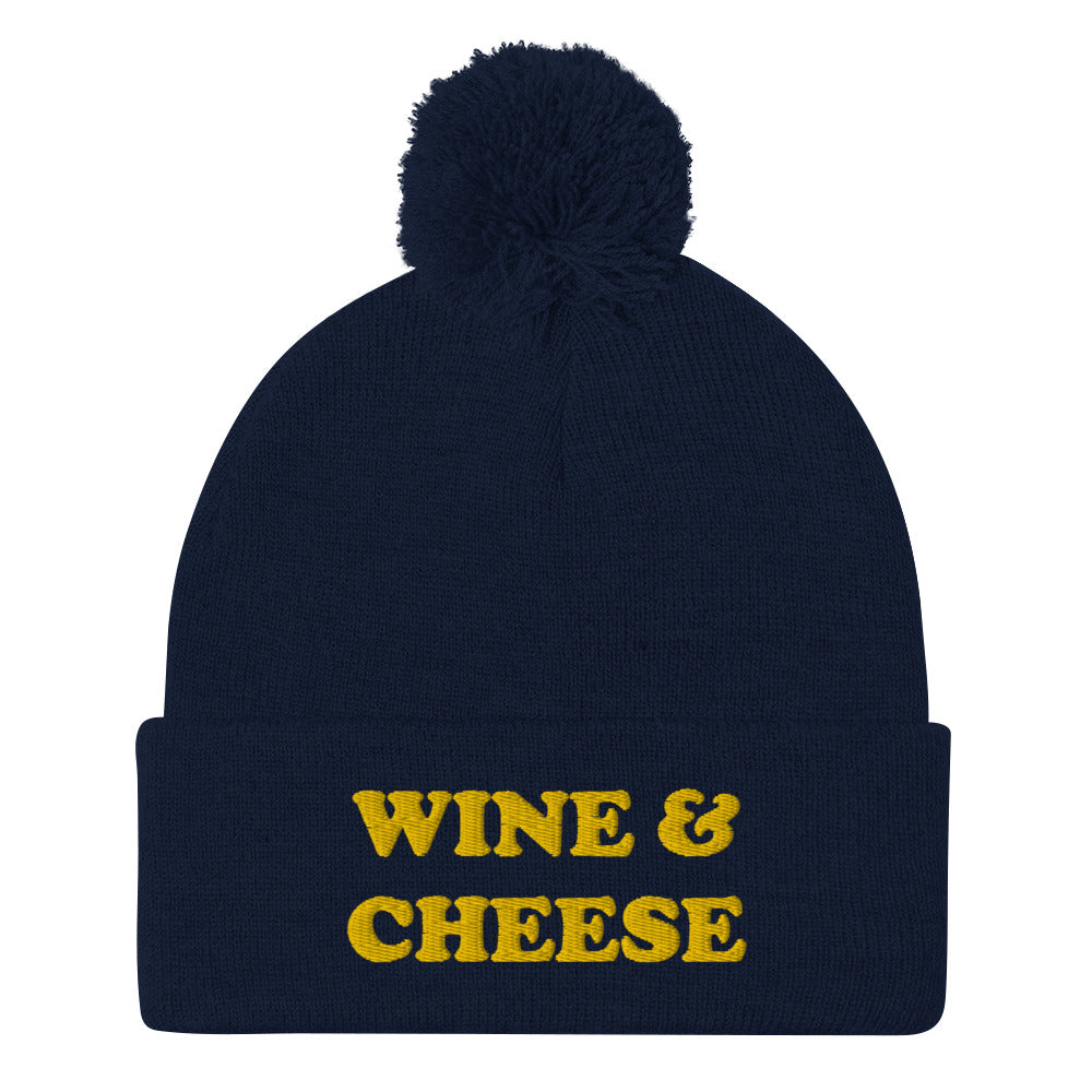 Navy Wine and Cheese Beanie - Love Wine and Cheese? Looking for a funny gift for a foodie? This warm and cozy beanie is just for you! It comes in a variety of colors with "Wine & Cheese", expertly embroidered on the front. The perfect hat for foodies of all kinds.