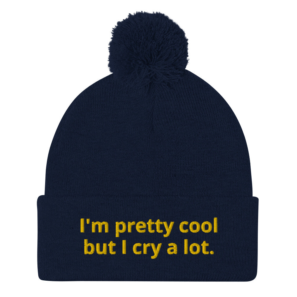 Weird Navy Beanie - Looking for a funny gift? A unique hat with a message? This beanie is warm and cozy with a classic pom pom on top and "I'm pretty cool but I cry a lot.", expertly embroidered on the front. Looking for something personalized? Shoot us an email!