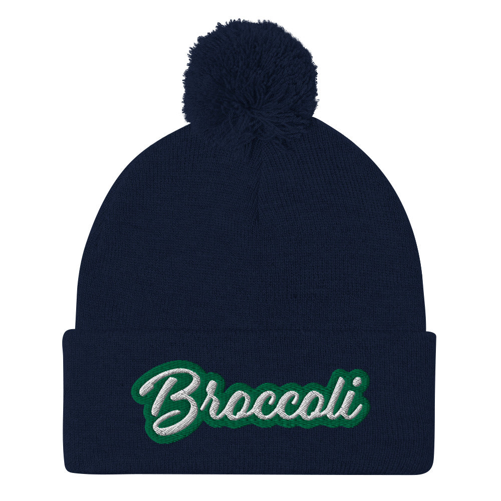 Navy Broccoli Beanie - Love broccoli? Looking for a weird gift for a foodie? This broccoli hat is just for you! It's a warm and cozy beanie with a classic pom pom on top and "broccoli", expertly embroidered on the front.