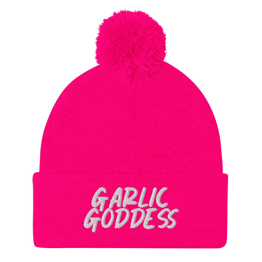 Pink garlic goddess beanie from Nina's Funky Shop by ninanush - GARLIC GODDESS ⚡ This unique garlic goddess hat is warm, cozy, designed by Nina and made just for you. It's a comfortable unisex garlic beanie with a pom pom on top, expertly embroidered with the words "garlic goddess". The perfect weird beanie for garlic lovers and funny garlic hat for garlic enthusiasts of all kinds.