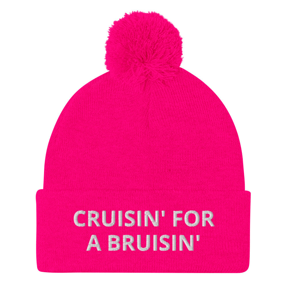 Pink Cruisin' for a Bruisin' Hat from Nina's Funky Shop by ninanush - This Cruisin' For A Buisin' Hat is warm, cozy, designed by Nina and made just for you. It's a comfortable unisex garlic beanie with a pom pom on top, expertly embroidered with the words "Cruisin For A Bruisin'". Stand out and stay warm in the perfect weird and funny beanie for all your cold weather looks.