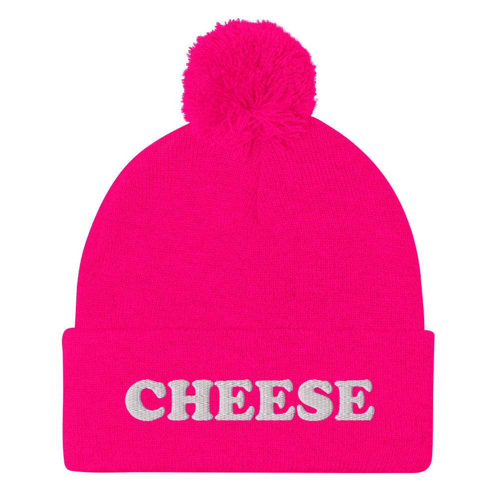 Neon Pink Embroidered Cheese Beanie from Nina's Funky Shop by ninanush - Do you love cheese? Looking for a funny foodie gift? This warm and cozy, embroidered beanie is just what you need. It's a classic pom pom beanie with "Cheese", expertly embroidered on the front. The perfect funny beanie for cheese lovers and foodies of all kinds. Eat cheese in style in our funky cheese enthusiast hats.