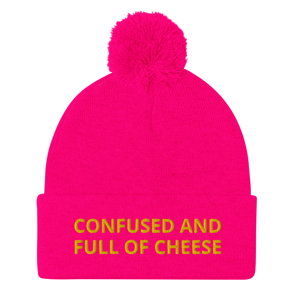 Pink beanie with confused and full of cheese embroidered on the front - Do you love cheese? Looking for a funny gift for a foodie? This warm and cozy, embroidered beanie is just what you need. It's a classic pom pom beanie with "Confused and full of cheese", expertly embroidered on the front. The perfect funny beanie for cheese lovers and foodies of all kinds.