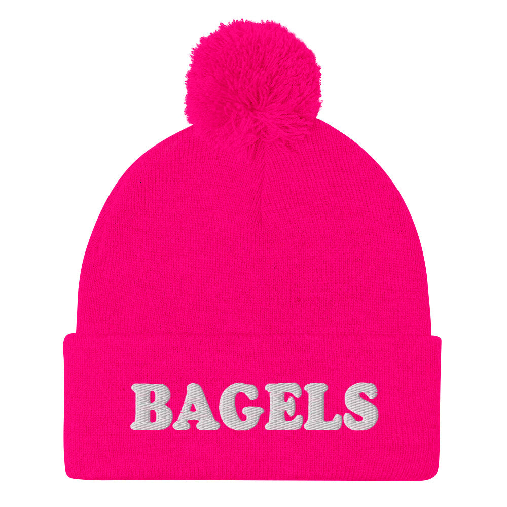 Pink Bagels Beanie -Are you a bagel enthusiast? Looking for a gift for a foodie? Our Bagels Beanie is comfortable, cozy and expertly embroidered just for you. It's a funny beanie with a pom pom on top, perfect for everyday streetwear for bagel lovers and foodies of all kinds.