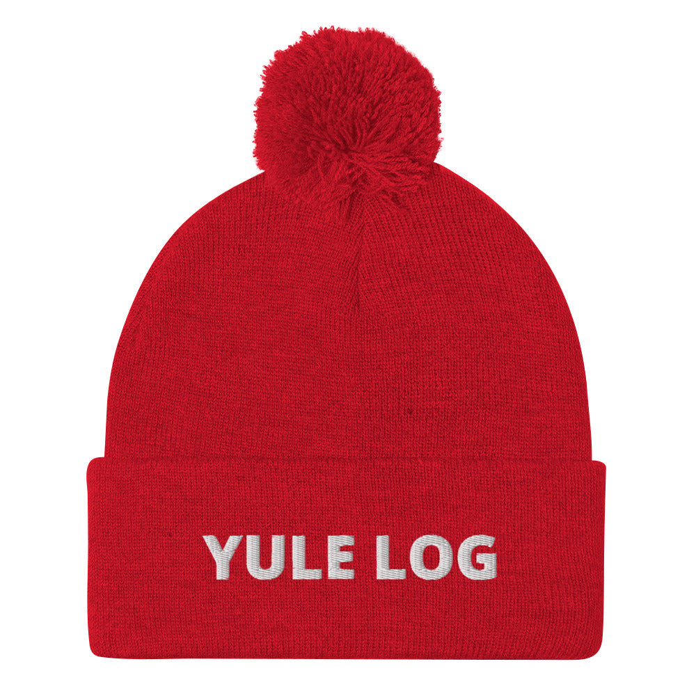 Red Yule Log Beanie from Nina's Funky Shop by ninanush - Do you love yule logs? Looking for a funny holiday hat? This warm and cozy, embroidered pom pom beanie is just what you need. Celebrate your favorite foods in style with this funny foodie Beanie with "Yule Log", expertly embroidered on the front. The perfect funny holiday gift or Christmas beanie for yule log lovers.