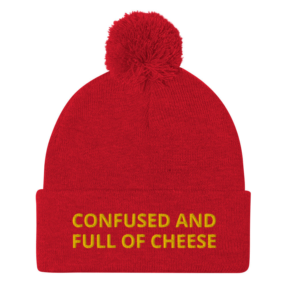 Red beanie with confused and full of cheese embroidered on the front - Do you love cheese? Looking for a funny gift for a foodie? This warm and cozy, embroidered beanie is just what you need. It's a classic pom pom beanie with "Confused and full of cheese", expertly embroidered on the front. The perfect funny beanie for cheese lovers and foodies of all kinds.