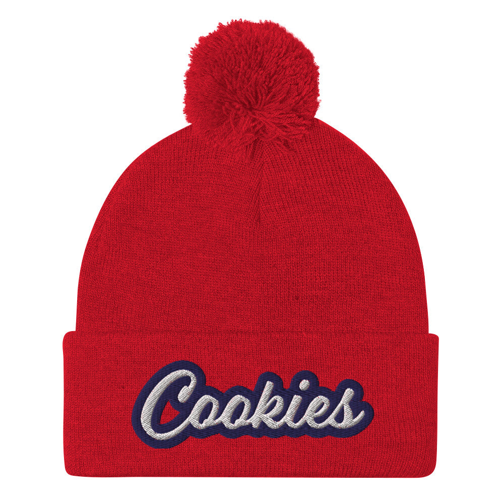 Red Cookie Hat - Love Cookies? Looking for a gift for a foodie? This cookies hat is just for you! It's a warm and cozy beanie with a classic pom pom on top and "Cookies", expertly embroidered on the front. Designed by Nina and made just for you! Looking for something personalized? A different embroidery color? Shoot us an email or check out our customizable apparel!