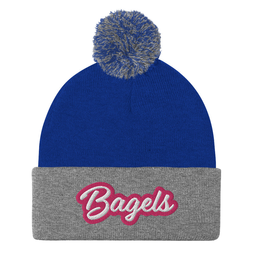 Blue and gray beanie for bagel lovers with pink writing  - Calling all bagel babes! Stay warm and make a statement in our pink and white embroidered beanie for bagel lovers. This funny foodie hat stands out and comes in a variety of colors. It's a unique bagel beanie that's comfortable and made just for you. Eat bagels in style or give it as a funny gift for bagel enthusiasts. 