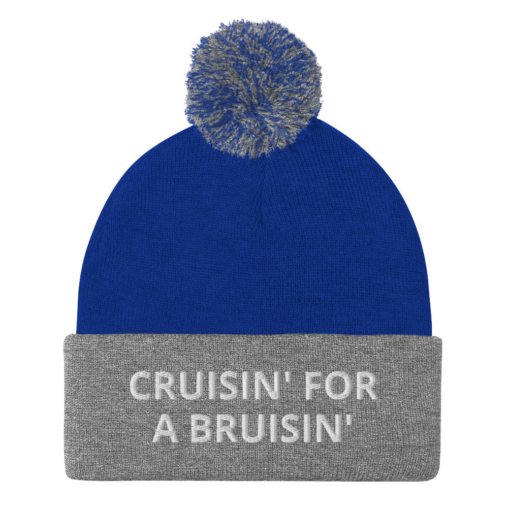 Royal Blue and Gray Cruisin' for a Bruisin' Hat from Nina's Funky Shop by ninanush - This Cruisin' For A Buisin' Hat is warm, cozy, designed by Nina and made just for you. It's a comfortable unisex garlic beanie with a pom pom on top, expertly embroidered with the words "Cruisin For A Bruisin'". Stand out and stay warm in the perfect weird and funny beanie for all your cold weather looks.