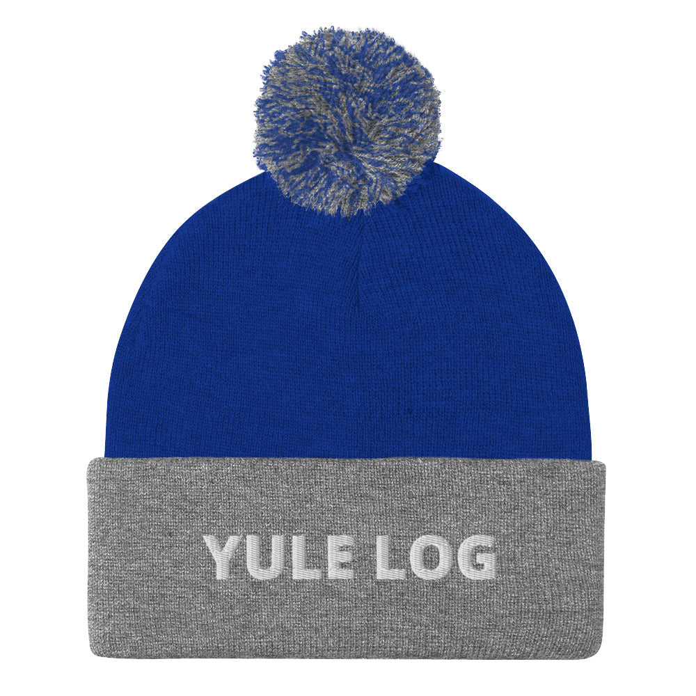 Royal Blue and Gray Yule Log Beanie from Nina's Funky Shop by ninanush - Do you love yule logs? Looking for a funny holiday hat? This warm and cozy, embroidered pom pom beanie is just what you need. Celebrate your favorite foods in style with this funny foodie Beanie with "Yule Log", expertly embroidered on the front. The perfect funny holiday gift or Christmas beanie for yule log lovers.