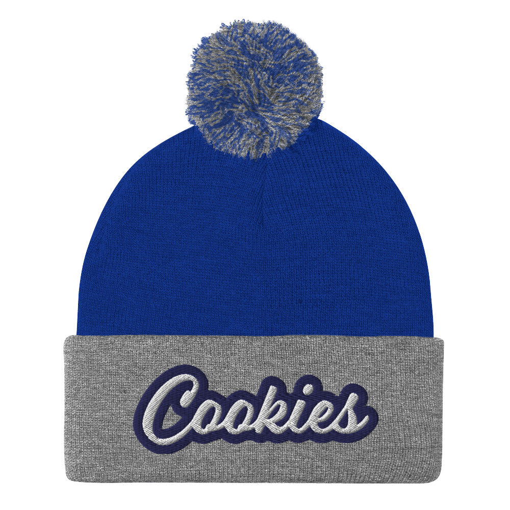 Gray and Royal Blue Cookie Hat - Love Cookies? Looking for a gift for a foodie? This cookies hat is just for you! It's a warm and cozy beanie with a classic pom pom on top and "Cookies", expertly embroidered on the front. Designed by Nina and made just for you! Looking for something personalized? A different embroidery color? Shoot us an email or check out our customizable apparel!