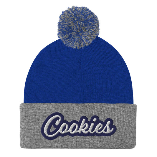 Gray and Royal Blue Cookie Hat - Love Cookies? Looking for a gift for a foodie? This cookies hat is just for you! It's a warm and cozy beanie with a classic pom pom on top and "Cookies", expertly embroidered on the front. Designed by Nina and made just for you! Looking for something personalized? A different embroidery color? Shoot us an email or check out our customizable apparel!