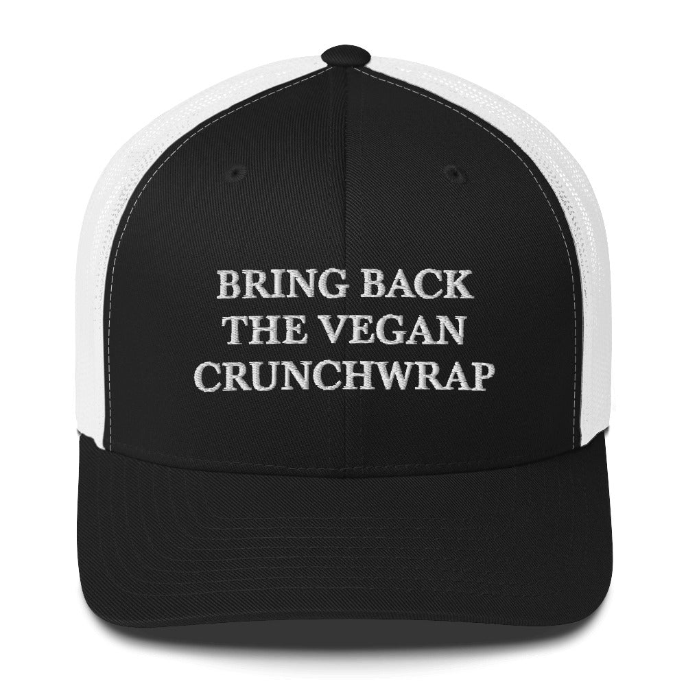 Black and White Bring Back The Vegan Crunchwrap Trucker Hat from Nina's Funky Shop by ninanush - Did you have a change to try the Tacobell vegan crunchwrap? Need a funny vegan foodie gift? This Bring Back The Vegan Crunchwrap Hat is comfortable, comes in a variety of colors and has a convenient adjustable closure. It's a fun vegan hat that's expertly embroidered and a perfect funny accessory for plant based babes.