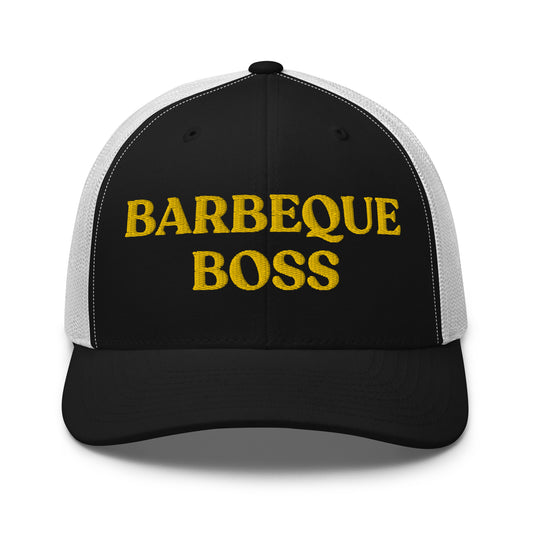 Black and white Barbeque Boss Hat - Are you the Barbeque Boss? Looking for a gift for your favorite BBQ buddy? Our Barbeque Boss Trucker Hat might be just for you! It's a classic trucker hat, expertly embroidered with a funny text design. Perfect for summer barbeques or everyday streetwear.