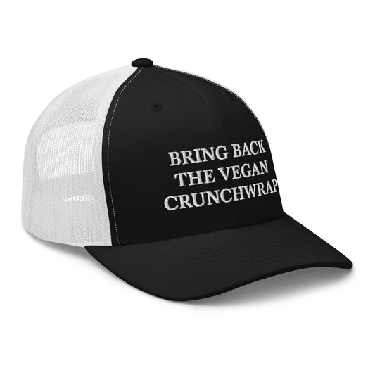 Black and White Bring Back The Vegan Crunchwrap Trucker Hat from Nina's Funky Shop by ninanush - Did you have a change to try the Tacobell vegan crunchwrap? Need a funny vegan foodie gift? This Bring Back The Vegan Crunchwrap Hat is comfortable, comes in a variety of colors and has a convenient adjustable closure. It's a fun vegan hat that's expertly embroidered and a perfect funny accessory for plant based babes.