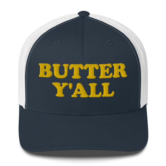 Blue and white Butter Hat - Are you a butter enthusiast? Looking for a funny gift? Our Butter Y'all Hat is comfortable and made just for you. It comes in a variety of colors with a funny butter phrase, expertly embroidered on the front. Make a statement and eat your favorite buttery foods in our butter y'all trucker hat. 