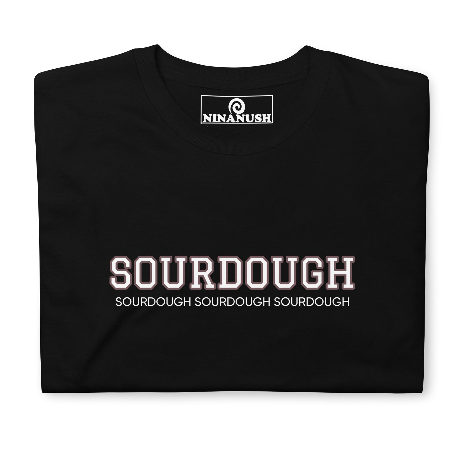 Black sourdough t-shirt from Nina's Funky Shop by ninanush - A sourdough t-shirt that's designed for sourdough lovers and foodies. Eat your favorite sourdough in style with this unique foodie tee. This cotton shirt is soft and comfortable with an eye catching brown and white design. The perfect gift for a sourdough enthusiast or a quirky tee for bread lovers of all kinds.